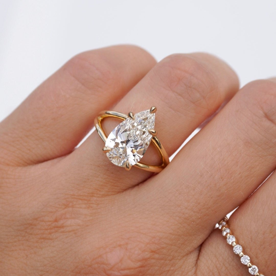 Stunning 3.91 CT Pear Moissanite Engagement Ring with Split Shank Design 4